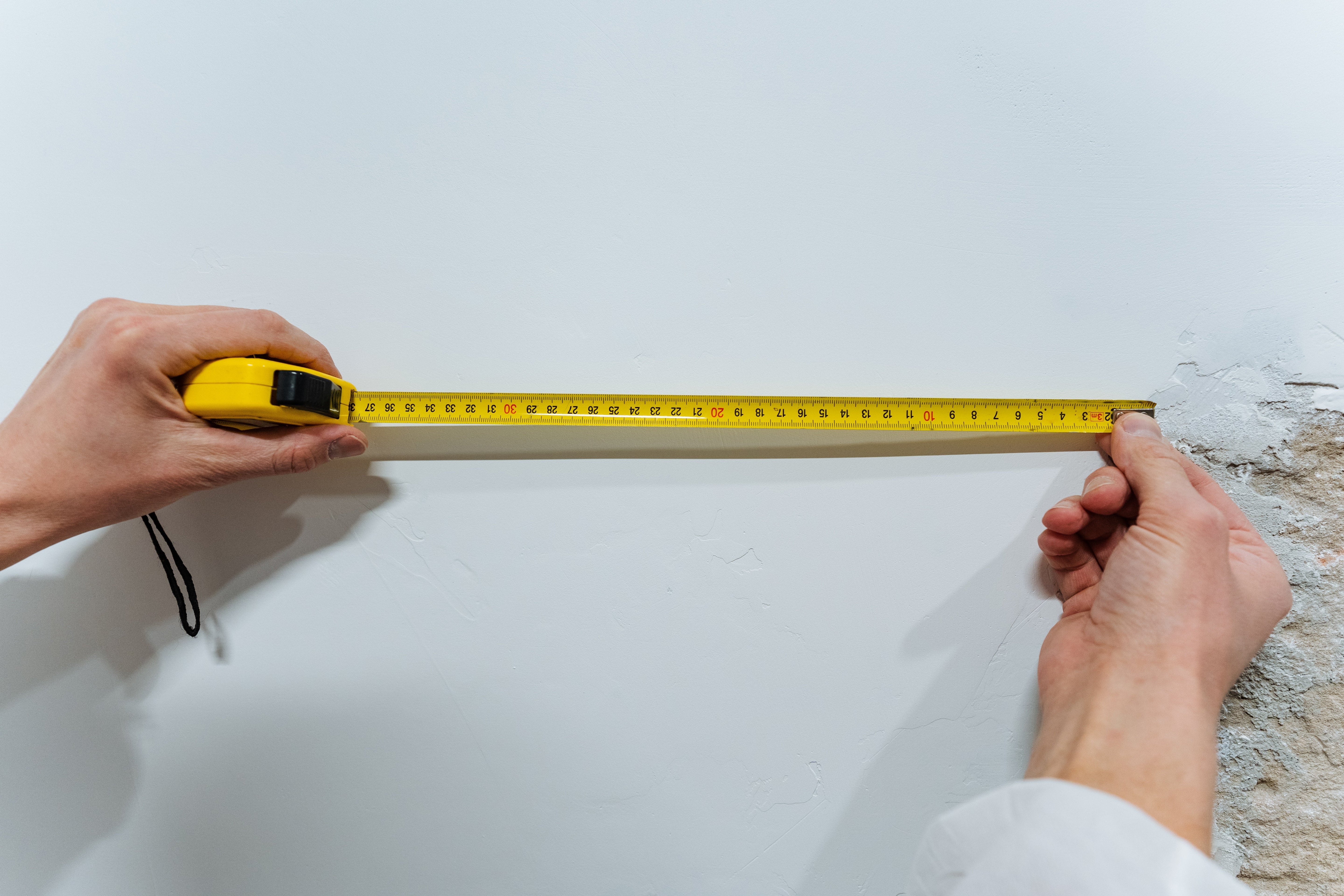 How to Find a Stud in an Exterior Wall for a Shade Sail