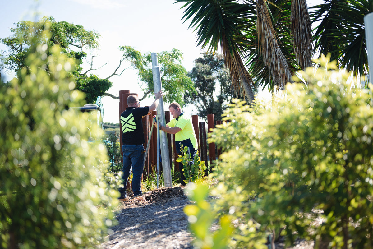 How to Set Shade Sail Posts in Concrete