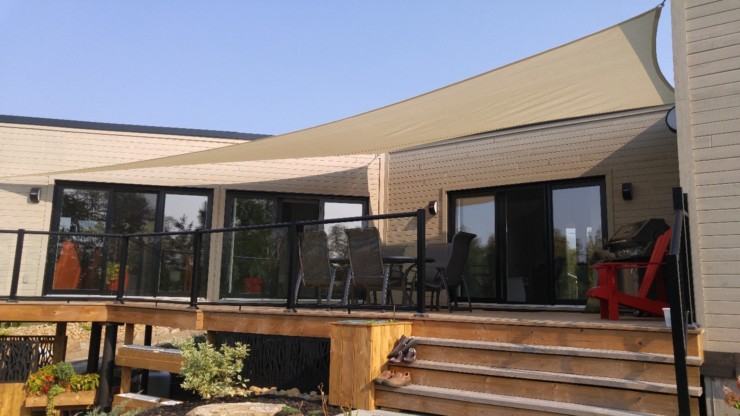 modern shade sail over patio